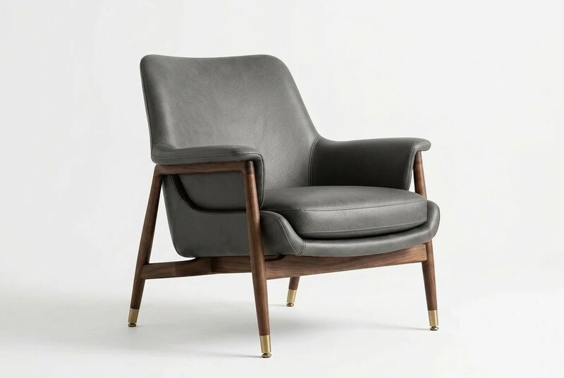 Furniture photography — leather lounge chair hero shot on a clean studio backdrop